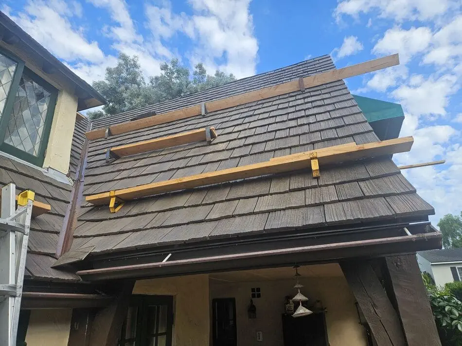 Wood shake roof being serviced in San Diego