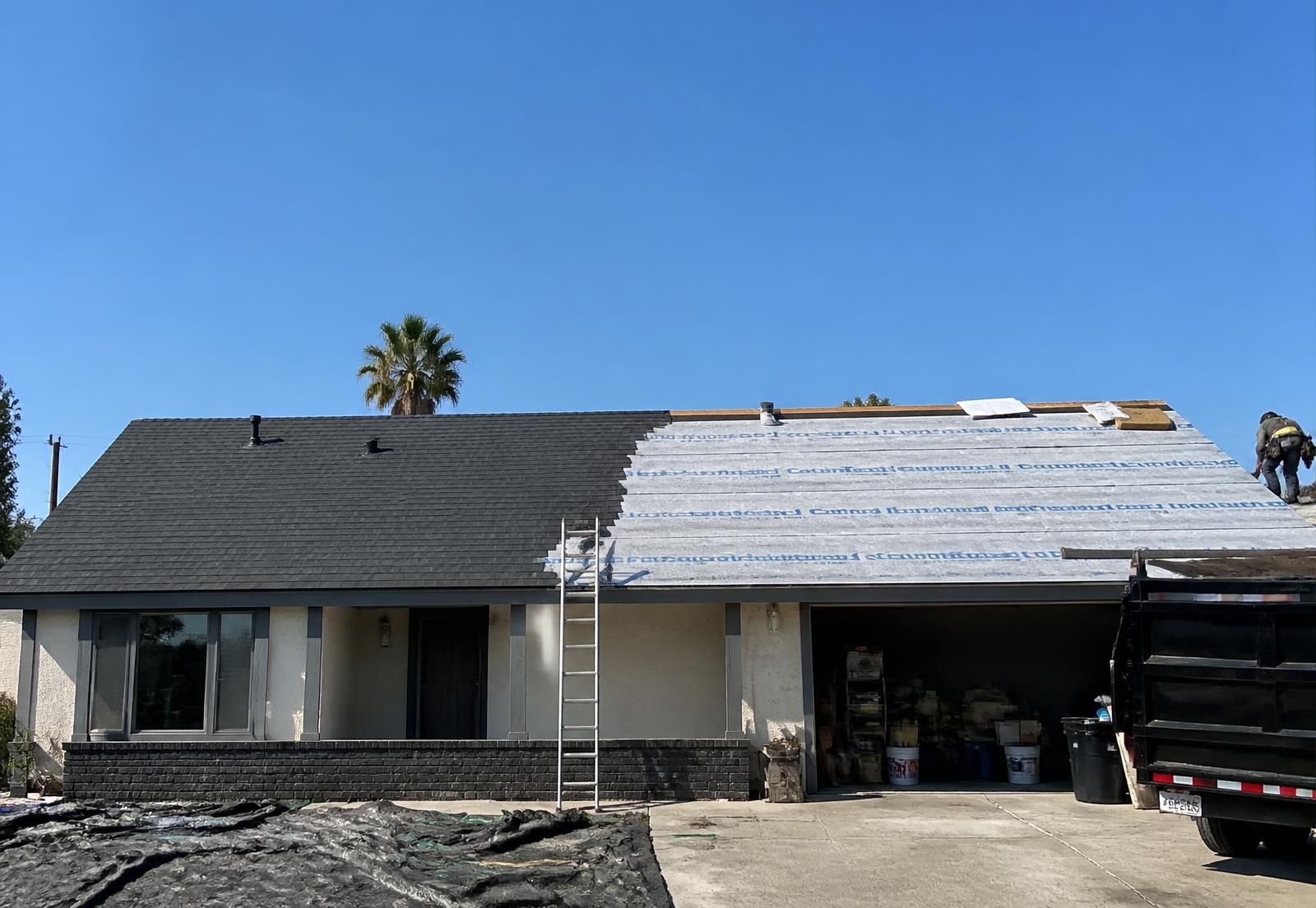 Southern California home mid tile-to-shingle conversion with new architectural shingles on one slope